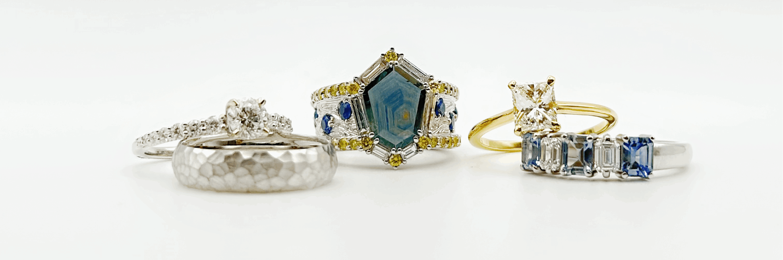 Sapphire and salt and pepper diamond rings