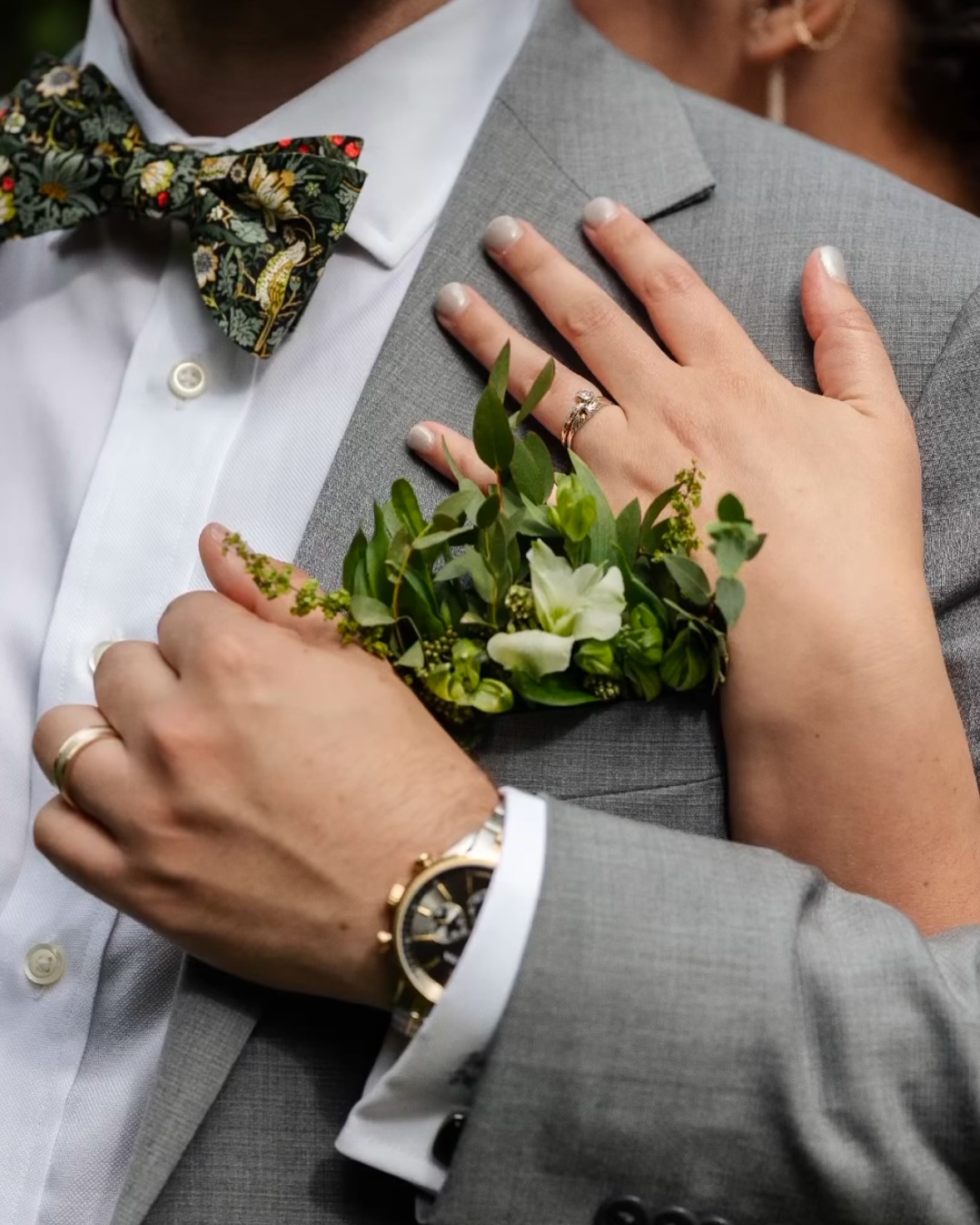 Hands wearing bespoke Zadel jewellery