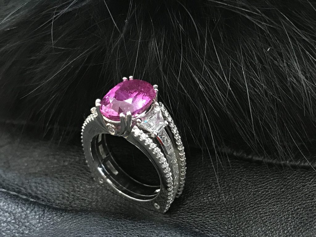 A pink sapphire ring in a handmade setting