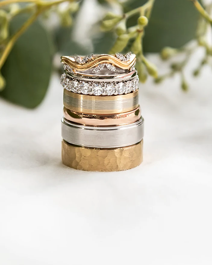A stacked set of handmade gold rings