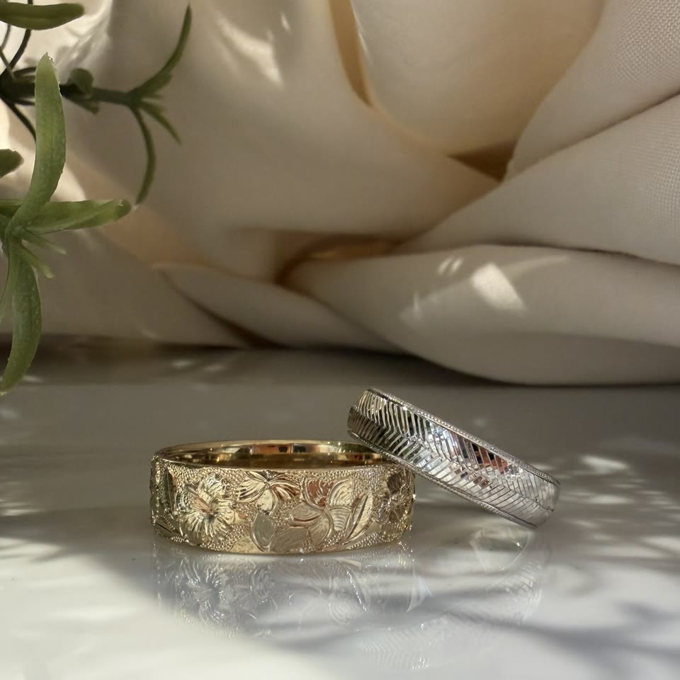 Two hand engraved wedding bands